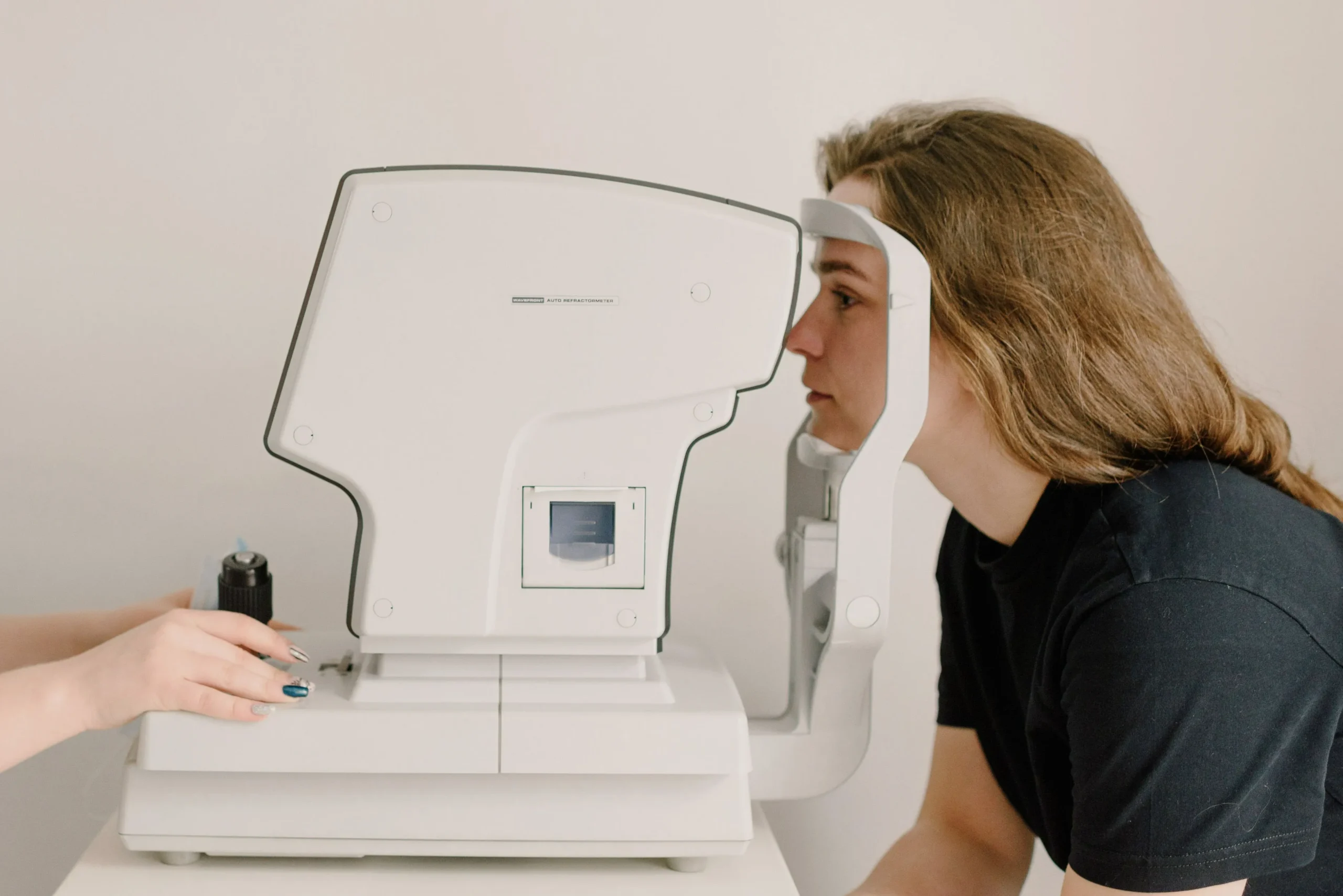 Eye examination before assessing suitability for blepharoplasty surgery.